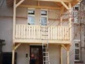 Vorgehängter Balkon mit Überdachung